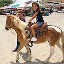 
 Pony ride at Miss Aruba's Flea Market fundraising